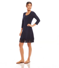 Load image into Gallery viewer, Add a touch of flair to your wardrobe with this fringe dress. Crafted from a luxurious, stretchy rayon, it offers both softness and comfort. Perfect for any event, whether you're heading out for a casual day or dressing up for an evening affair. Style it with heels, boots, sneakers, or sandals to complete your look.