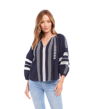 Load image into Gallery viewer, Lightweight cotton gives a breezy quality to this peasant top detailed with charming embroidery. This breezy top pairs perfectly with white pants for a fresh beachy look. Comes in both regular and plus sizes. Colors- Navy and white. Blouson sleeve V-neck Embroidered.