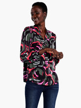 Load image into Gallery viewer, Nic and Zoe designers are a seriously talented bunch. Even idle turns of their pens can turn into something as unique as this dynamic black and pink top. Its birth may be rooted in the accidental, but intentional details show the upmost attention to even the smallest details. Details like elastic cuff sleeves, a shirt collar, a button front and a longer hem that extends just below the hip. This top is a piece of magnificent abstract art!