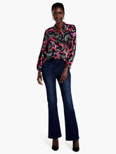 Load image into Gallery viewer, Nic and Zoe designers are a seriously talented bunch. Even idle turns of their pens can turn into something as unique as this dynamic black and pink top. Its birth may be rooted in the accidental, but intentional details show the upmost attention to even the smallest details. Details like elastic cuff sleeves, a shirt collar, a button front and a longer hem that extends just below the hip. This top is a piece of magnificent abstract art!