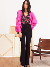 Load image into Gallery viewer, Nic and Zoe designers are a seriously talented bunch. Even idle turns of their pens can turn into something as unique as this dynamic black and pink top. Its birth may be rooted in the accidental, but intentional details show the upmost attention to even the smallest details. Details like elastic cuff sleeves, a shirt collar, a button front and a longer hem that extends just below the hip. This top is a piece of magnificent abstract art!