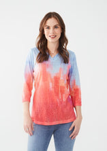 Load image into Gallery viewer, Unleash effortless style with the FDJ French Dressing Notch Neck 3/4 Sleeve Jersey Top. This chic and comfortable top features a mesmerizing abstract print in a vibrant Flamingo Gradient, making it the perfect addition to your collection. Styles beautifully with dress pants, jeans, shorts and skirts.