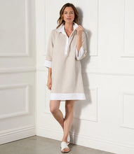 Load image into Gallery viewer, Elevate your warm-weather wardrobe with this chic linen shift dress by Karen Kane. Featuring stylish colorblock panels in tan and white, this dress offers effortless elegance and versatility. The breathable linen fabric keeps you cool in warm weather and warm in cooler temperatures, making it a perfect year-round choice. Designed with a split neckline, 3/4 sleeves, and an above-the-knee length, this dress is ideal for casual outings or semi-formal occasions.