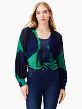 Load image into Gallery viewer, Woman wearing a blue and green patterned cardigan sweater with long bishop sleeves.