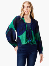 Load image into Gallery viewer, Woman wearing a blue and green patterned cardigan sweater with long bishop sleeves.