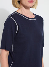 Load image into Gallery viewer, Crafted with Lightweight Double Face Cashmere, the Odessa Reversible Knit Short Sleeve Tee boasts a straight, boxy fit and features side slits, a crew neck, and a center back seam. This top is true to size and can be worn two ways for versatility, making it an ideal transitional piece that pairs well with pants, skirts, and shorts.