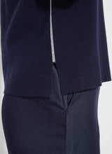 Load image into Gallery viewer, Crafted with Lightweight Double Face Cashmere, the Odessa Reversible Knit Short Sleeve Tee boasts a straight, boxy fit and features side slits, a crew neck, and a center back seam. This top is true to size and can be worn two ways for versatility, making it an ideal transitional piece that pairs well with pants, skirts, and shorts.