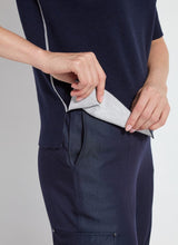 Load image into Gallery viewer, Crafted with Lightweight Double Face Cashmere, the Odessa Reversible Knit Short Sleeve Tee boasts a straight, boxy fit and features side slits, a crew neck, and a center back seam. This top is true to size and can be worn two ways for versatility, making it an ideal transitional piece that pairs well with pants, skirts, and shorts.