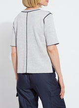 Load image into Gallery viewer, Crafted with Lightweight Double Face Cashmere, the Odessa Reversible Knit Short Sleeve Tee boasts a straight, boxy fit and features side slits, a crew neck, and a center back seam. This top is true to size and can be worn two ways for versatility, making it an ideal transitional piece that pairs well with pants, skirts, and shorts.