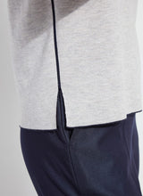 Load image into Gallery viewer, Crafted with Lightweight Double Face Cashmere, the Odessa Reversible Knit Short Sleeve Tee boasts a straight, boxy fit and features side slits, a crew neck, and a center back seam. This top is true to size and can be worn two ways for versatility, making it an ideal transitional piece that pairs well with pants, skirts, and shorts.