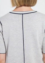 Load image into Gallery viewer, Crafted with Lightweight Double Face Cashmere, the Odessa Reversible Knit Short Sleeve Tee boasts a straight, boxy fit and features side slits, a crew neck, and a center back seam. This top is true to size and can be worn two ways for versatility, making it an ideal transitional piece that pairs well with pants, skirts, and shorts.