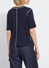 Load image into Gallery viewer, Crafted with Lightweight Double Face Cashmere, the Odessa Reversible Knit Short Sleeve Tee boasts a straight, boxy fit and features side slits, a crew neck, and a center back seam. This top is true to size and can be worn two ways for versatility, making it an ideal transitional piece that pairs well with pants, skirts, and shorts.