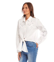 Load image into Gallery viewer, This lovely top is constructed with cotton fabric, allowing for softness and breathability. It showcases a floral embroidery in an eyelet design, elevating any ensemble with a touch of sophistication and femininity.