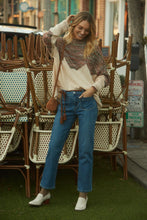 Load image into Gallery viewer, Our crosshatch denim is designed with a detachable belt for versatile styling options. It combines fashion with practicality, offering functional pockets and a zipper and button closure.