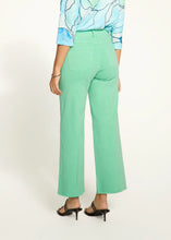 Load image into Gallery viewer, Make a statement in these effortlessly stylish wide-leg ankle jeans. Featuring a pintuck front seam and a frayed hemline, the Olivia design blends sophistication with a touch of modern edge. The high-rise waist provides a flattering fit, while the comfortable fabric ensures ease of movement all day long. Perfect for pairing with your favorite heels or sneakers, this versatile piece is a must-have addition to any wardrobe.