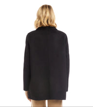 Load image into Gallery viewer, Woman wearing a black blazer and tan pants against a white background.