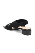 Load image into Gallery viewer, These stylish black slip-on sandals combine fashion and comfort, thanks to a flexible knit fabric and sleek organic heel. Elevate your look while staying comfortable all day long.