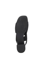 Load image into Gallery viewer, These stylish black slip-on sandals combine fashion and comfort, thanks to a flexible knit fabric and sleek organic heel. Elevate your look while staying comfortable all day long.