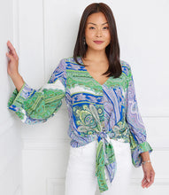 Load image into Gallery viewer, Featuring a captivating green and blue paisley print, this top effortlessly commands attention with its vibrant hues and eye-catching design. Designed with blouson sleeves and a tie-front detail, this top offers a relaxed yet chic silhouette that drapes beautifully on the body with a customizable fit.