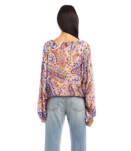 Load image into Gallery viewer, This stylish top features billowing blouson sleeves and a captivating paisley print. It pairs well with denim and is really a perfect top for any occasion. Color-Blues, purples, pink, gold. Watercolor paisley print. Crew neck. Elasticized hem. Lined. Italian fabric -100% Viscose.