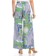 Load image into Gallery viewer, Celebrate the free-spirited style of bohemian-chic charm in these wide-leg pants. Crafted from soft viscose, they feature a lively paisley patch print, practical pockets, and a convenient elastic waist for maximum comfort.