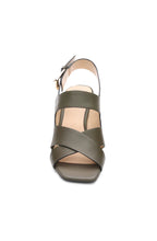 Load image into Gallery viewer, This heeled sandal in a gorgeous olive boasts a retro look, complete with inked edge details and a subtle icon buckle. Elevate any outfit with a touch of elegance.