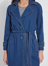 Load image into Gallery viewer, Woman wearing a closed blue denim trench coat over a grey tee.