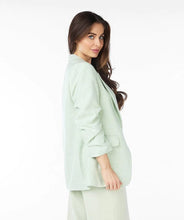 Load image into Gallery viewer, Opt for the Pietta Pastel Green Blazer Linen Look - EsQualo SP2410008 with smocked sleeves for a polished and stylish touch. Whether you're going for a casual spring look in cute jeans or a more refined look with our Pistachio-colored Cate City Trousers - EsQualo SP2410025, this blazer is the perfect choice.