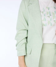 Load image into Gallery viewer, Opt for the Pietta Pastel Green Blazer Linen Look - EsQualo SP2410008 with smocked sleeves for a polished and stylish touch. Whether you're going for a casual spring look in cute jeans or a more refined look with our Pistachio-colored Cate City Trousers - EsQualo SP2410025, this blazer is the perfect choice.