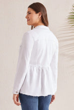 Load image into Gallery viewer, A peplum design creates a waist-defining silhouette in this timeless denim jacket. We can't get enough of the stretch denim fabric, button-up shank closure, shirt collar neck that offers a structured look, opening sleeve cuffs, functional flap chest pockets, hidden side seam pockets, 28.5" length, and trendy raw hem.