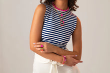 Load image into Gallery viewer, Glamorize your ensemble with the Suki Necklace! Made with premium crystals and antique gold plating on a brass base metal, it will be the highlight of any ensemble. A perfect jewelry piece to wear alone or layer with your other favorite pieces. Color- Pink, clear and gold. Pink crystal. Clear crystals. Antique gold plating over brass metal. Length -16" chain with a 2" extension.