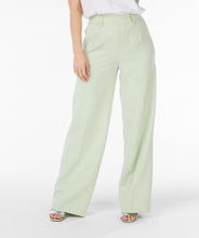 Load image into Gallery viewer, These gorgeous City Trousers in Pistachio are back in stock. With an elastic waistband and a wide leg design, they provide both comfort and style. Dress them up with heels or down with sneakers - the choice is yours. A must-have for any fashion-savvy wardrobe.