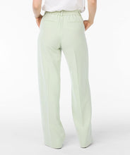 Load image into Gallery viewer, These gorgeous City Trousers in Pistachio are back in stock. With an elastic waistband and a wide leg design, they provide both comfort and style. Dress them up with heels or down with sneakers - the choice is yours. A must-have for any fashion-savvy wardrobe.