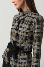 Load image into Gallery viewer, This versatile jacket boasts a funnel collar and a belt-cinch closure to achieve a sharp silhouette. Paired with cropped sleeves and button fastenings, this signature plaid pattern offers an elegant touch. Crafted to last, this timeless design promises a sophisticated look that will remain timeless. Color- Black, white and tan. Black buttons. Cinch belt. Funnel collar. Crop sleeves. Nonfunctional pockets.