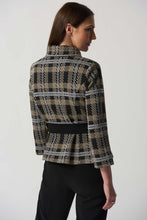 Load image into Gallery viewer, This versatile jacket boasts a funnel collar and a belt-cinch closure to achieve a sharp silhouette. Paired with cropped sleeves and button fastenings, this signature plaid pattern offers an elegant touch. Crafted to last, this timeless design promises a sophisticated look that will remain timeless. Color- Black, white and tan. Black buttons. Cinch belt. Funnel collar. Crop sleeves. Nonfunctional pockets.