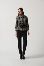Load image into Gallery viewer, This versatile jacket boasts a funnel collar and a belt-cinch closure to achieve a sharp silhouette. Paired with cropped sleeves and button fastenings, this signature plaid pattern offers an elegant touch. Crafted to last, this timeless design promises a sophisticated look that will remain timeless. Color- Black, white and tan. Black buttons. Cinch belt. Funnel collar. Crop sleeves. Nonfunctional pockets.