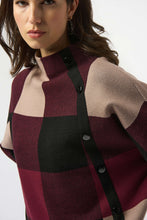 Load image into Gallery viewer, Closeup of a woman wearing a burgundy, black and taupe patterned sweater.