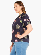 Load image into Gallery viewer, Sometimes it's all in the name! This dramatic combo of dark background and powerful pops of color on this stunning top is an outfit scene stealer, a real conversation piece. It's not just the firework display design though: we love the layered details on the short sleeves, the easy elastic cuffs, the frilled split neck, and the tie front. Dress it up with professional workpants or keep things casual with denim.