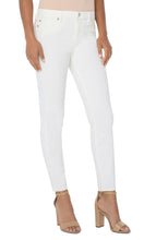 Load image into Gallery viewer, Our Piper "Hugger" is a standout in the perfect shade of Porcelain! Super soft and amazing stretch with our high-performance premium denim! These jeans showcase our signature "Hugger" angled seam detail on the back yoke to create a lifting, shaping and slimming effect. This jean is super flattering with a beautiful fit, making them easy to dress up or down. 