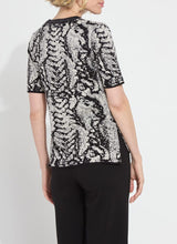 Load image into Gallery viewer, Crafted from the naturally elastic Knit Jacquard, the Preston Knit Short Sleeve Sweater features a ribbed neckline, side slits, and a delicate hint of shimmering Silver Lurex. This lightweight, transitional sweater is versatile enough for both casual and dressy occasions. It has a fitted shoulder design that leads to a straight body silhouette.