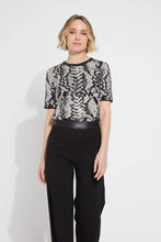 Load image into Gallery viewer, Crafted from the naturally elastic Knit Jacquard, the Preston Knit Short Sleeve Sweater features a ribbed neckline, side slits, and a delicate hint of shimmering Silver Lurex. This lightweight, transitional sweater is versatile enough for both casual and dressy occasions. It has a fitted shoulder design that leads to a straight body silhouette.