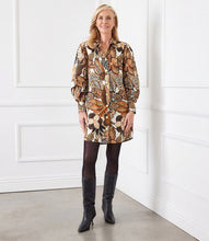Load image into Gallery viewer, This shirtdress, expertly crafted from premium French cotton, showcases a striking safari floral print. The design is elevated by blouson sleeves and elegant gold buttons. Incorporate a piece of French style into your wardrobe with this sophisticated and stylish dress.