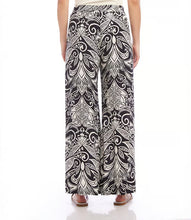 Load image into Gallery viewer, Experience the classic charm of the deco monotone print with our Print Wide Leg Pants in Black and White by Karen Kane. This refined pattern perfectly complements the wide-leg silhouette and features a flowy design and soft viscose fabric for effortless style and unrestricted movement. Elevate your wardrobe with this elegant and functional piece.