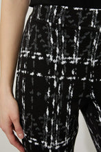 Load image into Gallery viewer, This straight-leg Joseph Ribkoff pant offers a slim fit and smooth appearance. Complement the vibrant patterning with a solid top for a standout outfit. Color- Black and white. Elastic waist. No pockets. No zipper. Not lined. Straight leg. Fabric -38% Polyester. 30% Nylon. 30% Viscose Rayon. 2% Spandex.