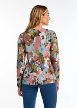 Load image into Gallery viewer, The exquisite floral print and classic v-neckline render this sweater an essential item for the season. A dazzling array of colors merges to form a striking floral composition. Pair it with your cherished denim or elevate the look with a skirt or trousers.