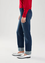 Load image into Gallery viewer, Enhance your style with these statement pull-on cuffed jeans, adorned with sparkling rhinestones arranged in a criss-cross pattern on the cuffs. This eye-catching jean, designed by French Dressing, features a 5-pocket design and a simulated zipper closure for a complete look.