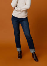 Load image into Gallery viewer, Enhance your style with these statement pull-on cuffed jeans, adorned with sparkling rhinestones arranged in a criss-cross pattern on the cuffs. This eye-catching jean, designed by French Dressing, features a 5-pocket design and a simulated zipper closure for a complete look.