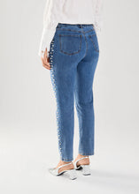 Load image into Gallery viewer, Make a statement with our Patrice Pull-On Pencil Ankle Denim, adorned with elegant pearl embellishments running down the outer side of each leg. This piece also includes a 5-pocket design and a faux zipper closure, adding a touch of contemporary style.
