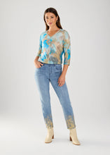 Load image into Gallery viewer, Experience effortless elegance in our 5-pocket pull-on pencil denim, featuring eye-catching gold foil print detailing at the hem and a faux zipper closure.