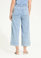 Load image into Gallery viewer, Designed for effortless elegance, these wide-leg crop trousers offer a relaxed yet polished look. The pull-on waistband ensures all-day comfort, while the soft pleats and faux-cuffed hems add a refined touch